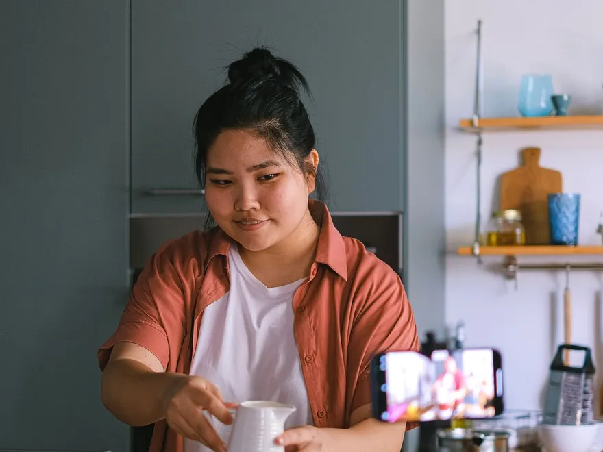 Content being filmed in a kitchen
